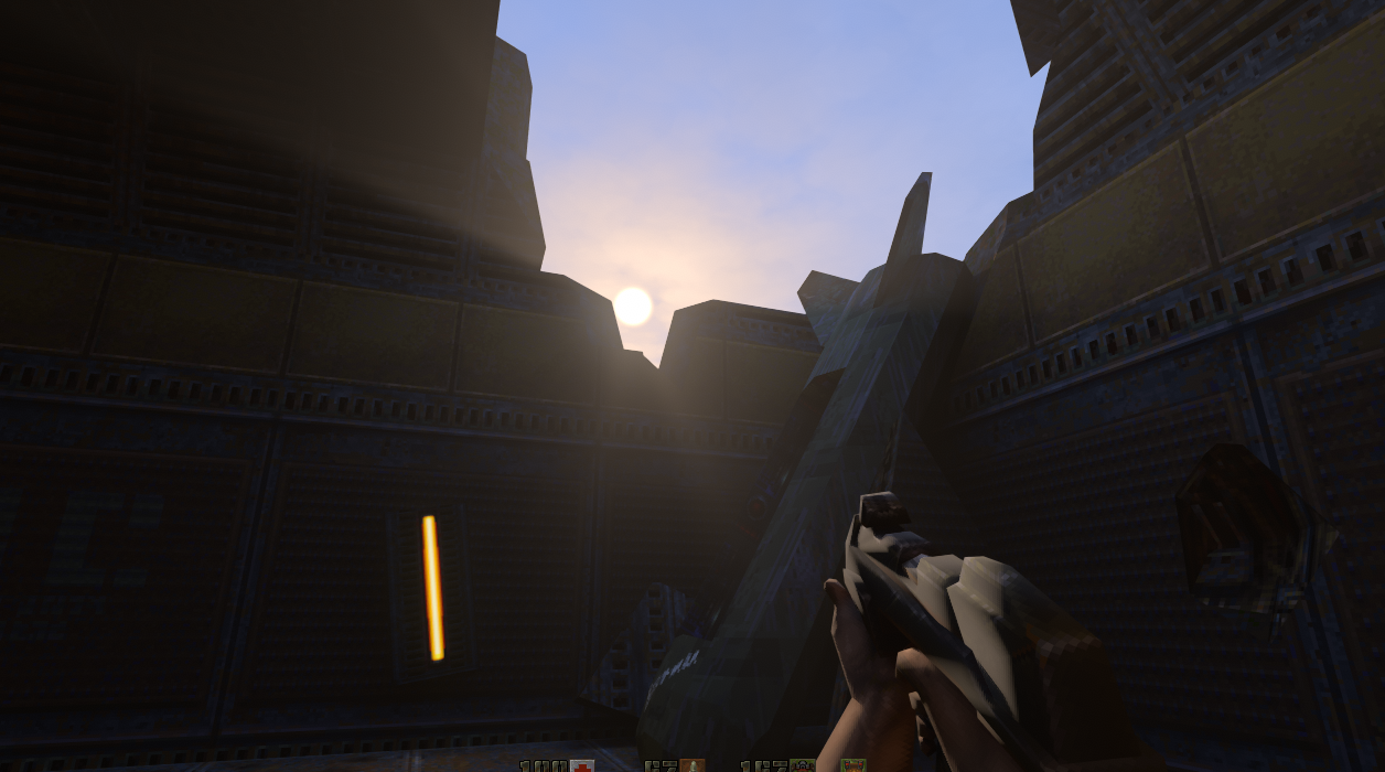 Dynamic sunlight over the Quake II industrial skyline.