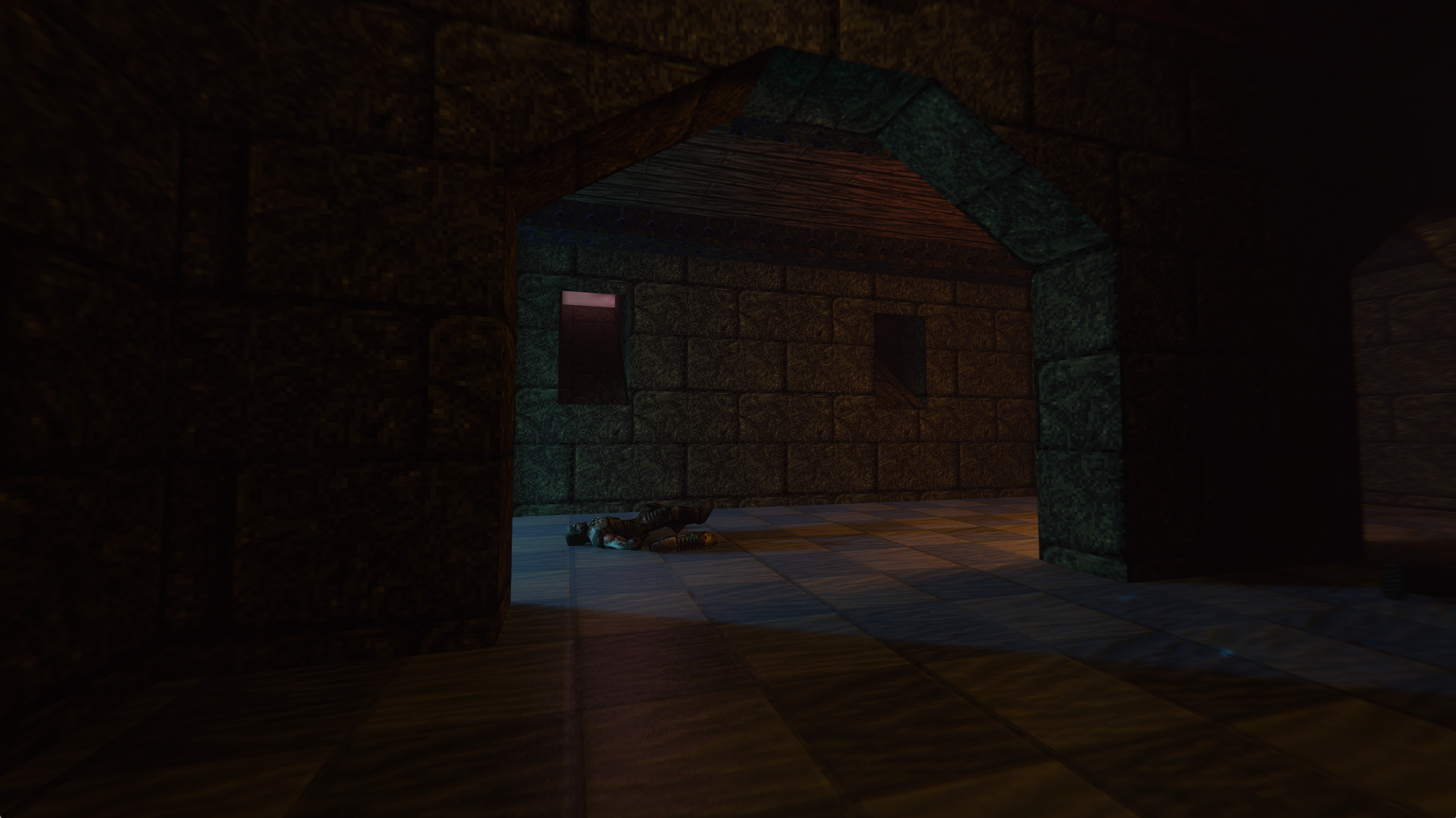 Colored lighting transforms a dark stone corridor.