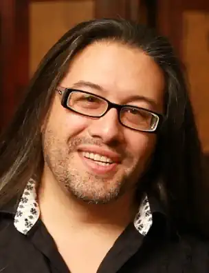 In an alternate timeline, Doom co-creator John Romero made System Shock